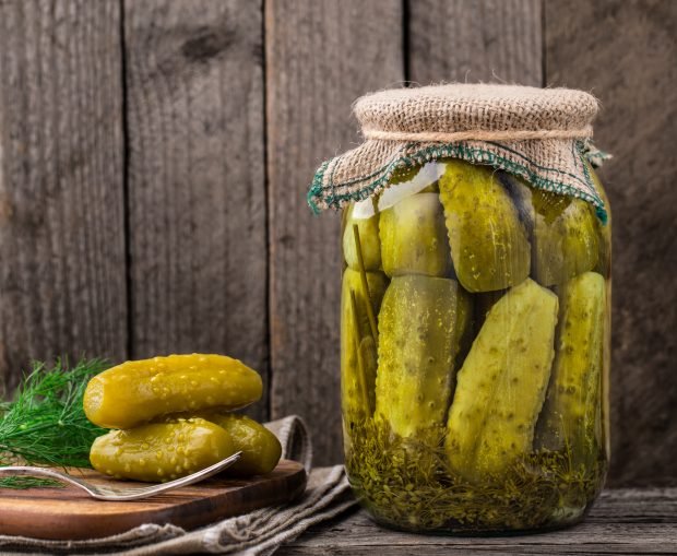 Pickled cucumbers with vinegar for the winter in jars